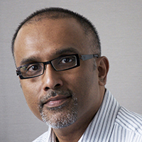 Dr Cherian George