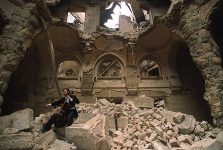 Vedran Smailović plays his cello in the destroyed National Library, Sarajevo Vedran Smailović plays his cello in the destroyed National Library, Sarajevo