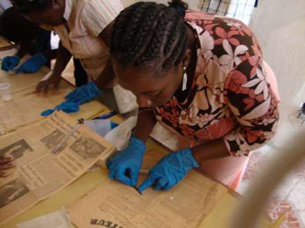 a workshop participant busy with small repairs and gaps filling a workshop participant busy with small repairs and gaps filling
