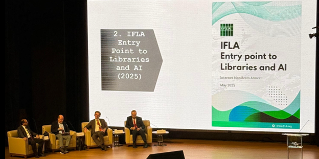 Four men in armchairs on a stage with, in the background, a slide showing the IFLA Entry Point to Libraries and AI