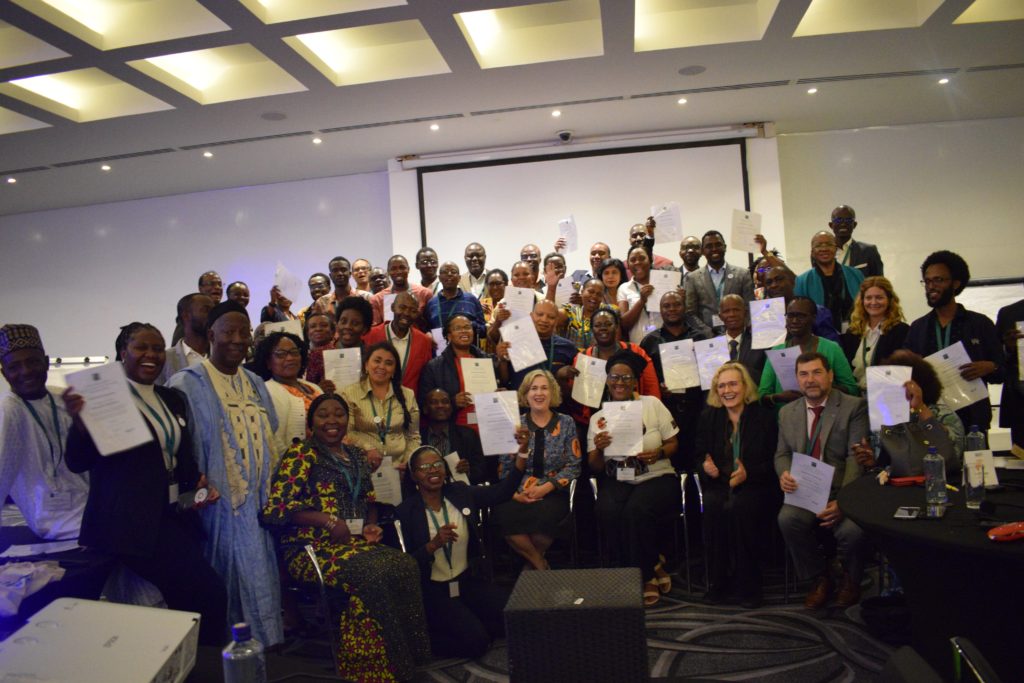 DSC 0144.NEF 1024x683 Picture of a group of participants posing for a picture with their certificates during IFLA Regional Workshop, Nairobi, Kenya