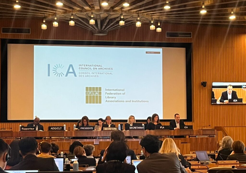 UNESCO meeting room showing IFLA and ICA delegates presenting