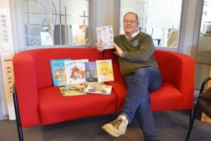 Trondelag 1 The librarian shows Saami language books at the Trøndelag County Library, Norway.