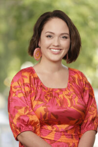 woman in orange dress