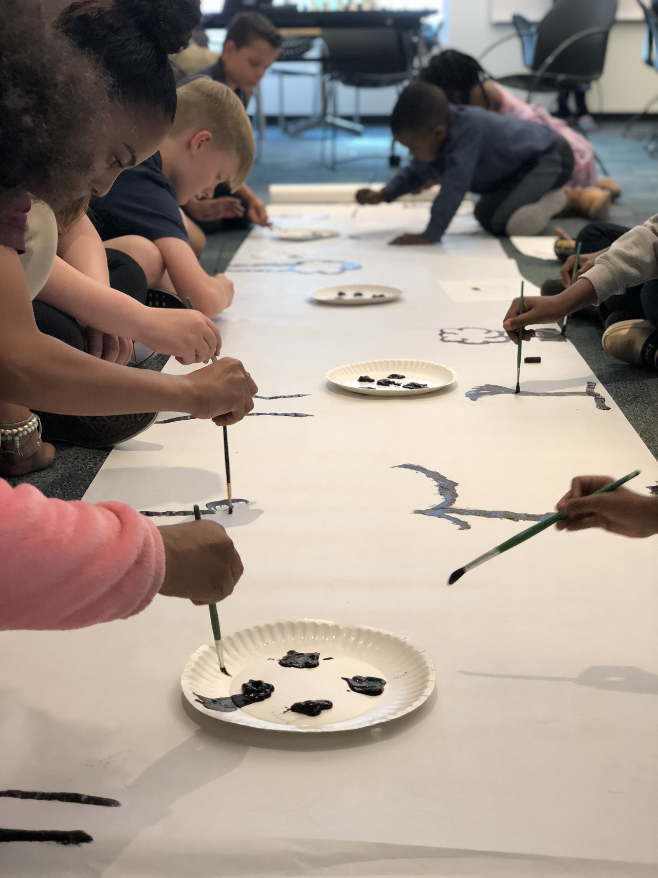 Bilingual arts and crafts classes are offered for babies, young children, and their parents in the Denver Public Library.